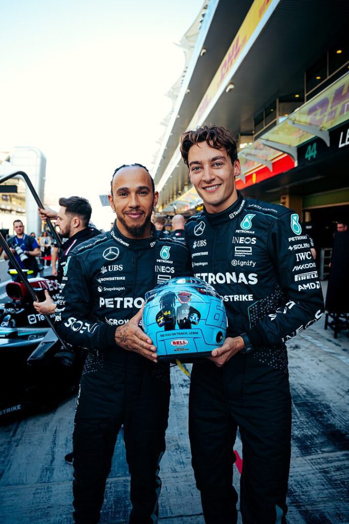 Lewis Hamilton and Geroge Russell pose together at the end of the 2024 race season.